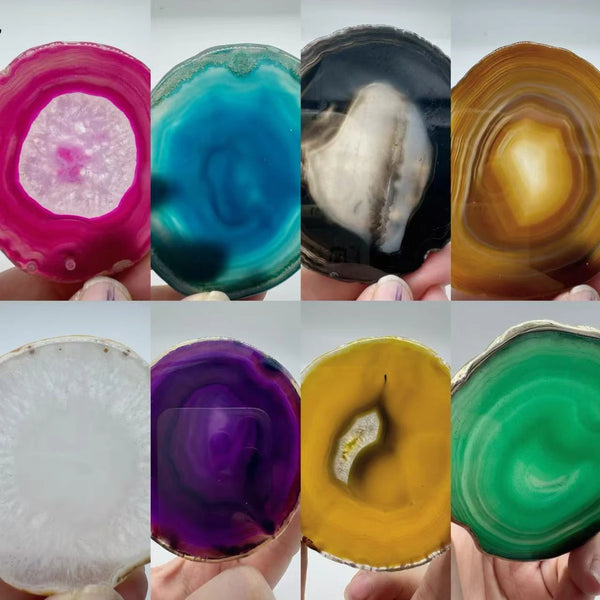 Natural agate slice coaster, 8-10 cm, held in a hand for scale